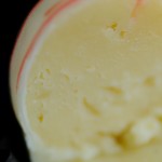 Examining a White Chocolate Truffle