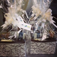 Finished gift baskets with custom tags. Finished gift baskets with custom tags. 55 of them total! Great way to thank your conference speakers and sponsors!