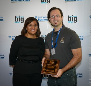 Andy Ciordia accepts Small Business Big Impact Award for The Secret Chocolatier